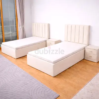 New Pair of single upholstered beds with headboards and mattresses - beige