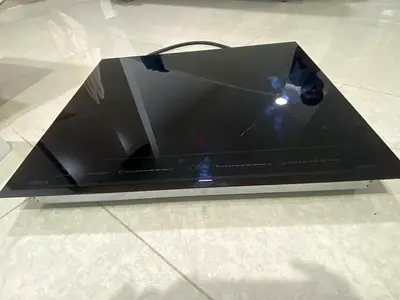 Teka induction hob60 cm 4 zone featuring MultiSlider touch controls and a sleek ceramic glass finis