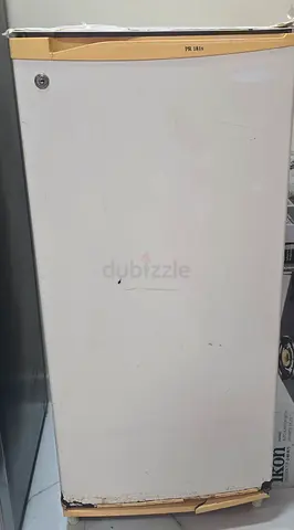 Used single-door upright freezer / refrigerator - compact unit