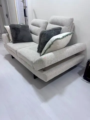 Light grey 2-seater sofa in good condition