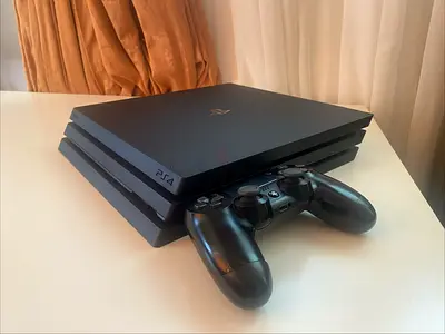 Sony PlayStation 4 Pro with DualShock 4 Controller - Good Condition