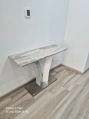 Small modern marble-effect side table with metal base