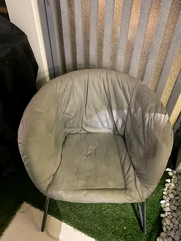 Used round cushioned lounge chair (papasan-style) - green