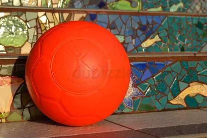 Bright Orange Rubber Play Ball — Good Condition