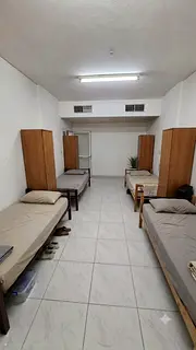 Bed Space for working ladies in central AC building in Abu Shagara