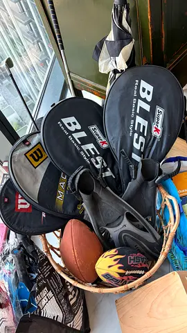 Mixed sports bundle: tennis rackets, golf clubs, fins, balls, padels. 150aed for all