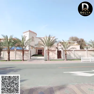 Villa for sale with modern designs and finishes with large spaces | 9 bedrooms | Area 10,000 sq ft | Al Rawda 3 | On a main street | Close to social f