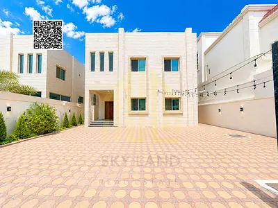 Large villa in Al Muwaihat area, directly from the owner, freehold, close to all services, with electricity, water, and air conditioning.