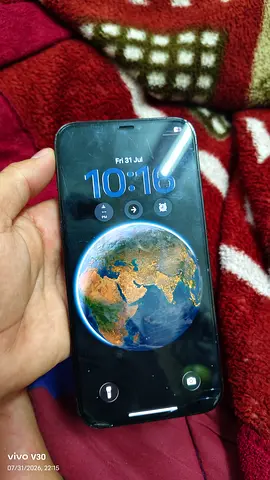 Used Apple iPhone with case, working display — good condition