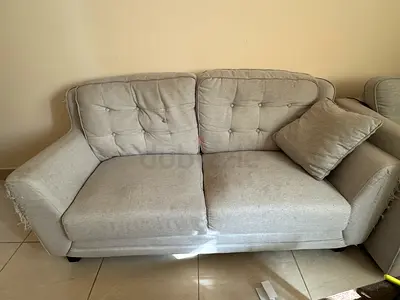 Light grey 2-seater sofa with cushions - good condition. Light grey single seater sofa-goodcondition