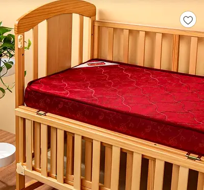 Wooden cot with mattress for sale