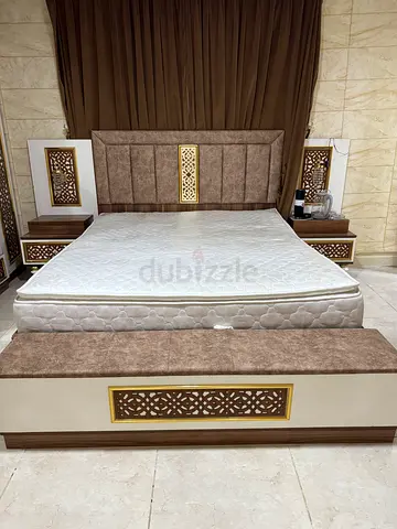 King size upholstered bed frame with mattress and matching bedside tables