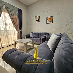 Beautiful furnished one-bedroom apartment with new furniture for monthly rent in Ajman - Corniche -