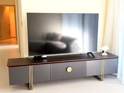 55-65 inch LED Smart TV in excellent working condition with tv stand