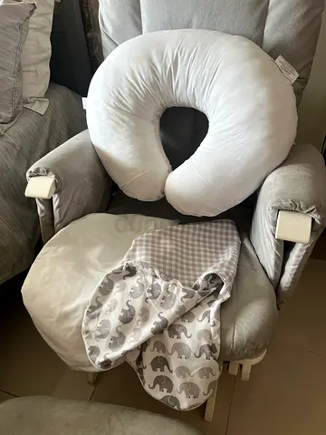 Boppy Nursing Pillow with one cover (elephant print and gingham) and one pillow protector