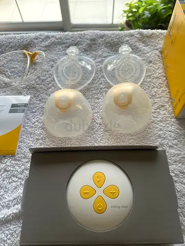 Medela Freestyle-style Breast Pump with Extra Flanges and Accessories (Used)