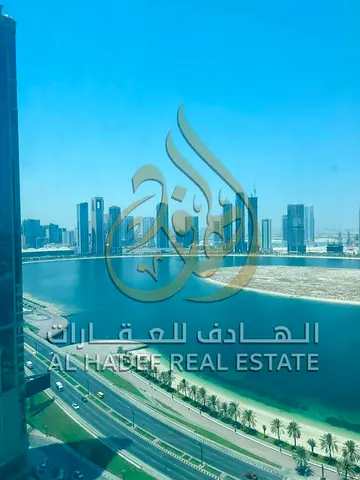 * Balcony. * Storage room. * Private parking space. * Prime location near Pearl of the Gulf and Al Khan Intersection. * Close to schools, markets, res