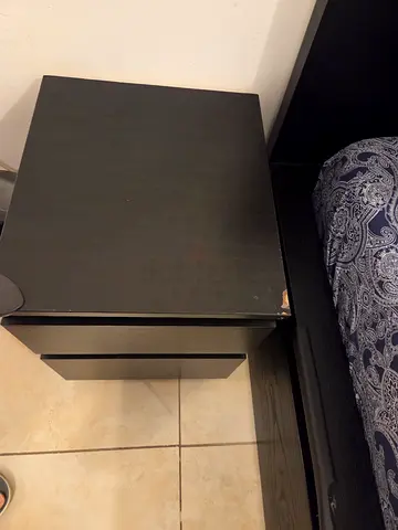 Used black bedside table / nightstand - small chip on corner
