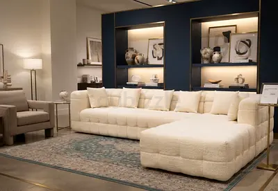 Modern Sectional Sofa

A stylish sectional sofa featuring a contemporary tufted design and extra-dee