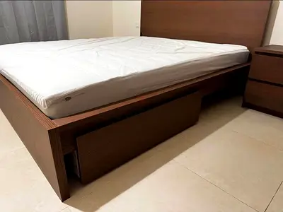 Ikea Queen size bed with mattress underneath 2 storage drawers available in perfect condition