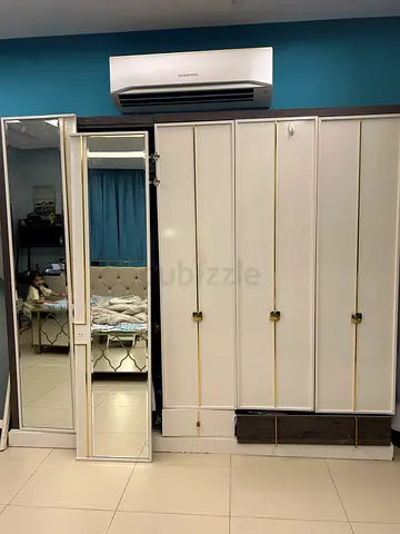 White 5Door Wardrobe / Armoire in Good Condition I brought it in 5000  , now selling in 500