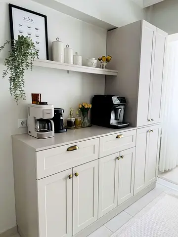 Beige Shaker-Style Kitchen Cabinets with Tall Pantry Unit