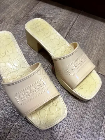 Coach beige patent leather slide sandals - size unknown, lightly used