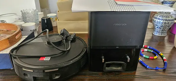 Roborock robot vacuum with auto-empty dock — used, working