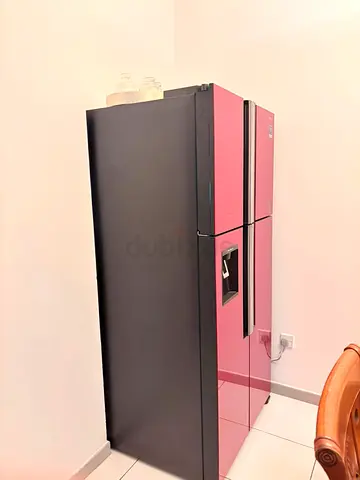 Used double-door refrigerator with water dispenser - good condition
