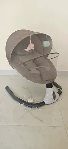 Electric baby swing/rocker with canopy and mobile - good condition