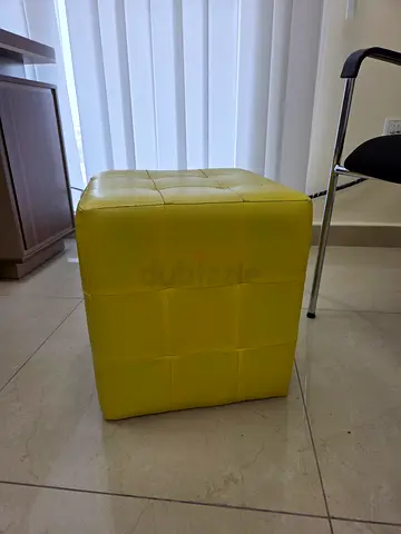 2 Yellow square ottoman / footstool in good condition
