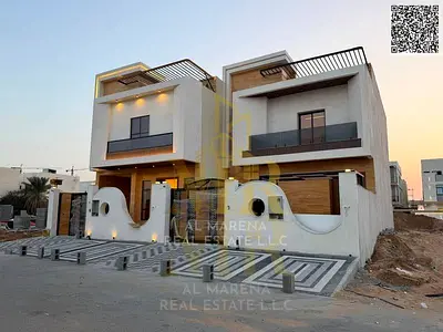 | Own a two-story villa with a rooftop terrace and luxurious finishes in Al Helio 2, Ajman, close to amenities | 4 master bedrooms | Price includes re