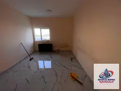 **Spacious one-bedroom apartment with a living room in Al Buṭainah, Sharjah**, featuring a **large