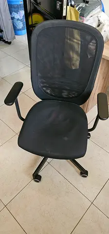 Used Black Mesh Office Chair with Armrests and Wheels