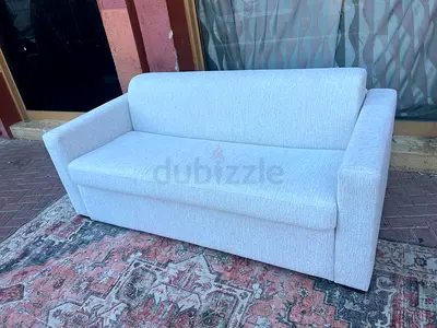 Italian comodo two seater sofa bed with mattress