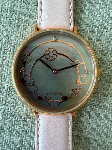 Coronet heart motif analog watch with mother-of-pearl dial diamond stones pink leather strap