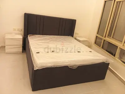 Grey fabric double bed with storage and new mattress