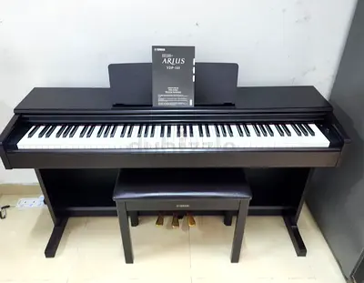 The Yamaha Arius YDP-105R is an 88-key digital console piano featuring GHS weighted action, AWM