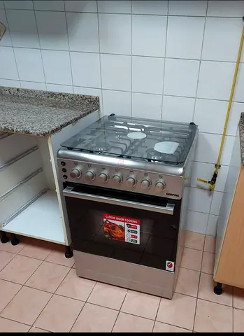 4-burner Gas Cooker with Oven - Stainless Steel, Good Condition