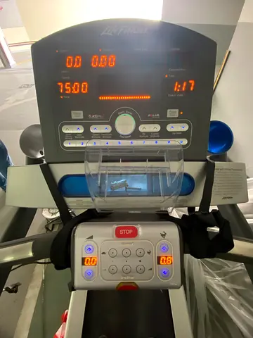 Pre-owned treadmill with digital console — good working condition Brand Name LIFE FITNESS