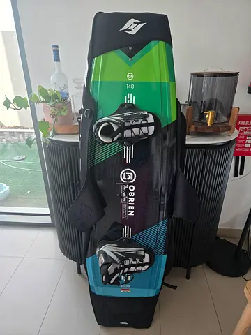 O'Brien 140cm wakeboard with clutch bindings and tow rope