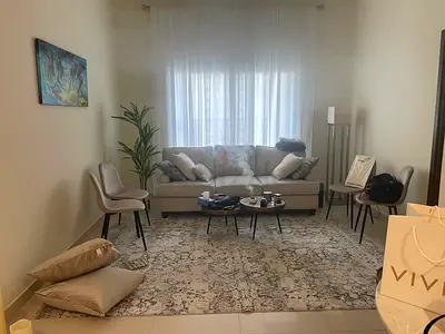 Light grey patterned living room sofa