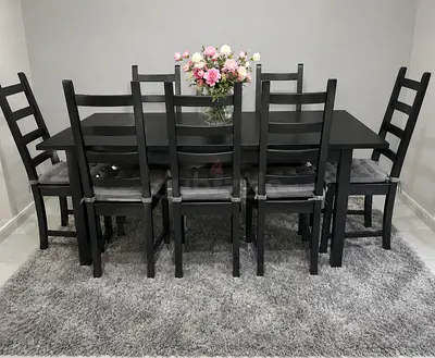 Solid wood Extendable dining table with 8 chairs. IKEA