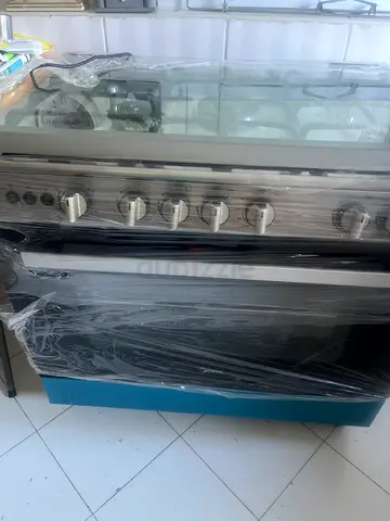 6-burner Stainless Steel Gas Cooker with Oven - Fairly used and Wrapped