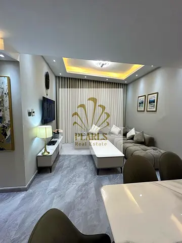 Luxury 2BR apartment for annual rent in Garden City Towers, 2 bathrooms, premium finish, prime location, AED 40,000/year, payable in 4 installments.