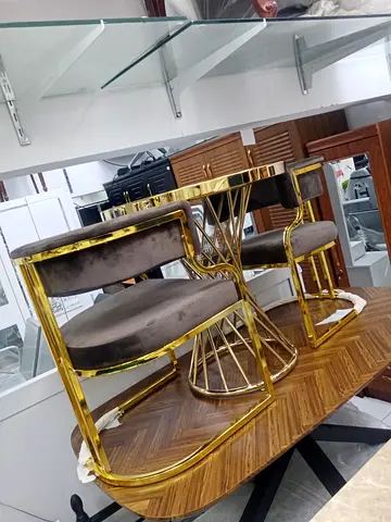 Brand New luxury Table and 2 chairs Available