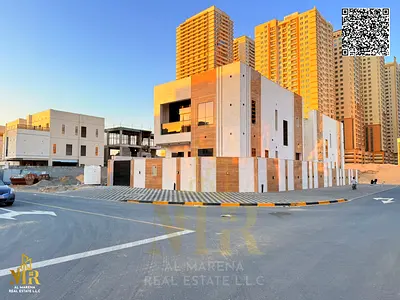 Corner villa behind Mohammed Bin Zayed Rd, 2 floors, 5 master bedrooms, price includes all fees, prime location, ideal for living or investment.