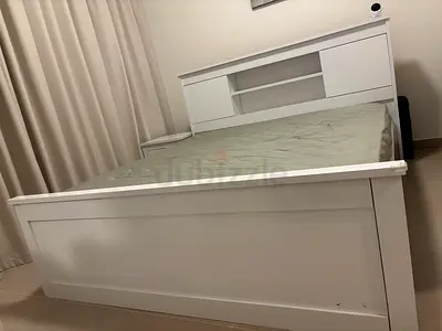 White wooden king size bed frame with headboard storage - good condition