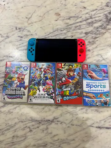 Nintendo Switch OLED (With Games)