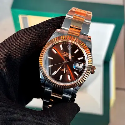 Rolex Datejust 41 (Reference 126331), featuring a chocolate brown dial and a two-tone Everose gold a